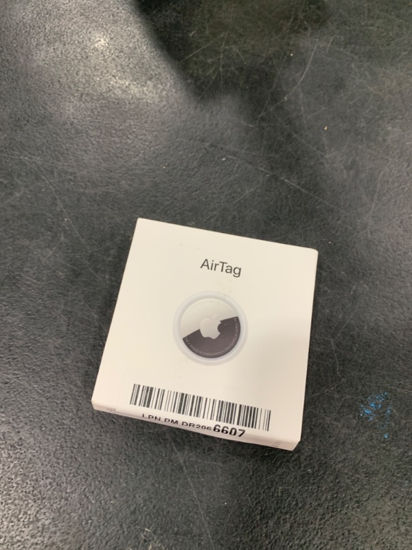 Photo 1 of Apple AirTag. Keep Track of and find Your Keys, Wallet, Luggage, Backpack, and More. Simple one-tap Set up with iPhone or iPad