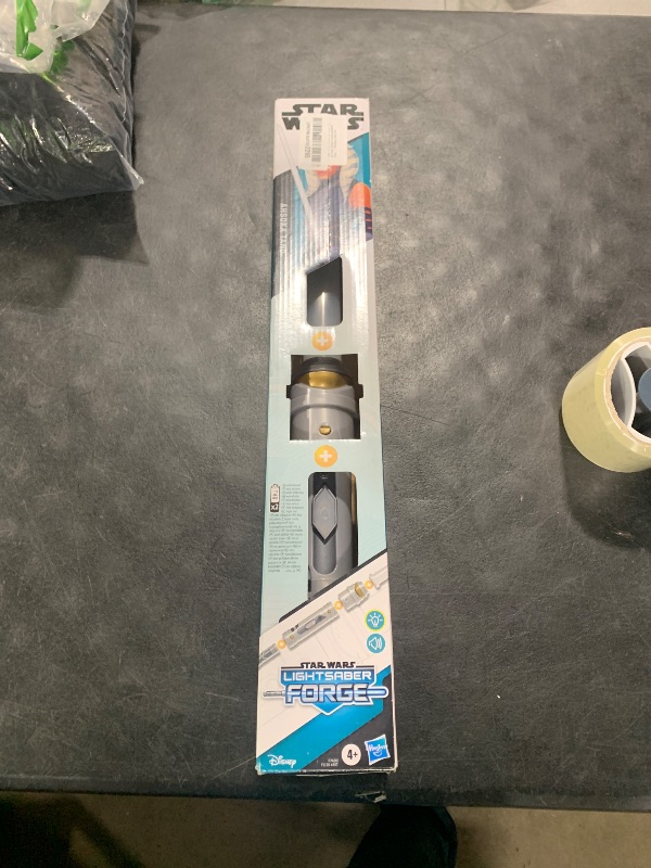 Photo 1 of STAR WARS Lightsaber Forge Yoda, Green Customizable Electronic Lightsaber, Toys for 4 Year Old Boys and Girls