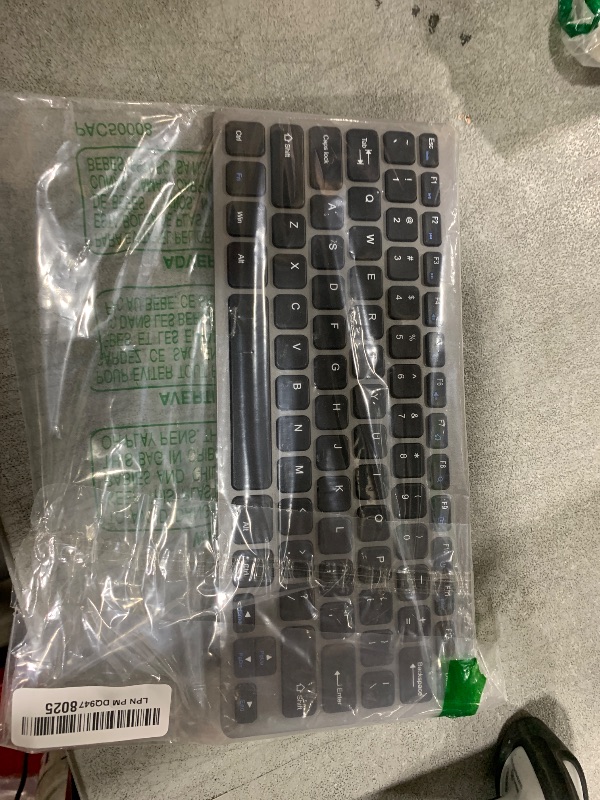 Photo 1 of Compact Wireless Keyboard Mouse, 2.4GHz Ultra Thin Small Wireless Keyboard Mouse Combo for Desktop, Laptop (Black and Gray)