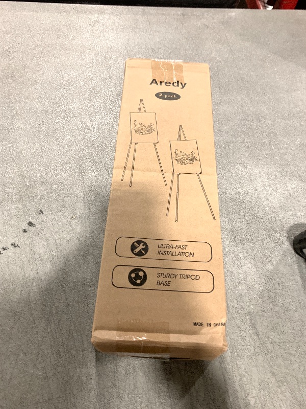 Photo 1 of Easel Stand for Display, Aredy 63" Portable Painting Easel, Lightweight Metal Easels for Painting Canvas, Wedding Sign (2 Pack)