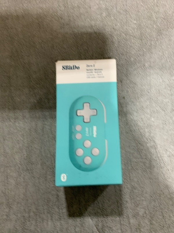 Photo 1 of Nargos 8Bitdo Zero 2 Bluetooth Key Chain Sized Mini Controller for Nintendo Switch, Windows, Android and macOS (Turquoise Edition)