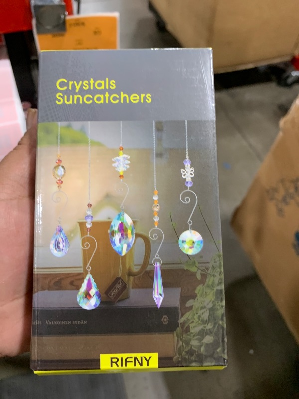 Photo 1 of Crystal Suncatchers, RIFNY Hanging Crystals Ornament Sun Catcher with Chain, 9 Pack Glass Beads Ball Prisms Pendant Rainbow Maker for Window Home Office Garden Decoration