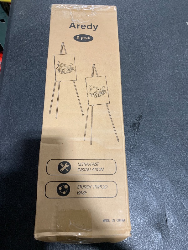 Photo 1 of Easel Stand for Display, Aredy 63" Portable Painting Easel, Lightweight Metal Easels for Painting Canvas, Wedding Sign (2 Pack)
