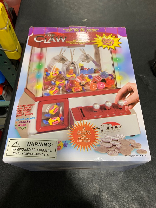 Photo 1 of 
Etna Electronic Arcade Claw Machine - Toy Grabber Machine with Flashing LED Lights and Sound