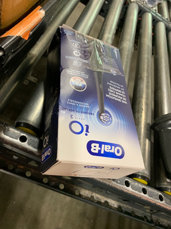 Photo 1 of Oral-B iO Series 2 Rechargeable Electric Powered Toothbrush Starter Kit, Night Black with 2 Brush Heads - Automatic Pressure Sensor to Protect Gums - 3 Modes - 2 Min Timer
