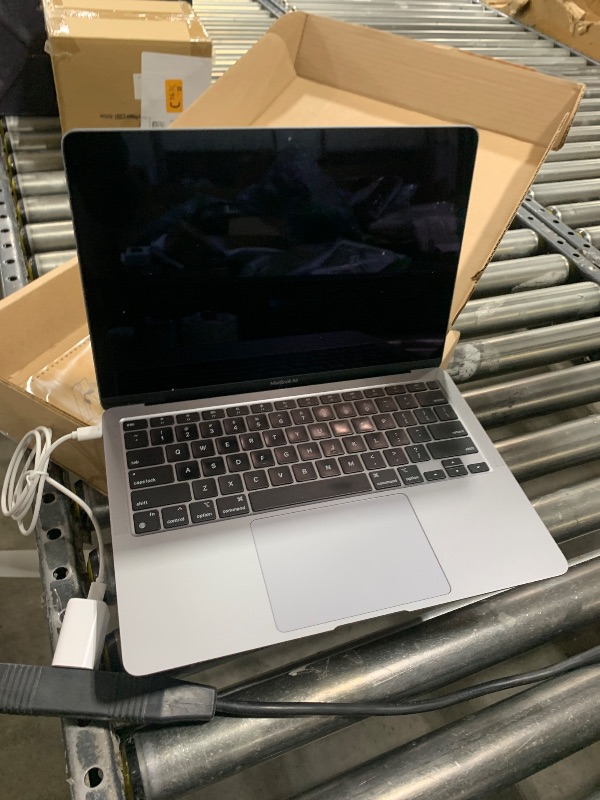 Photo 1 of Apple MacBook Air 2020 13.3-inch (Apple M1 Chip, 8GB RAM, 128GB SSD Storage) - Space Gray (Renewed)