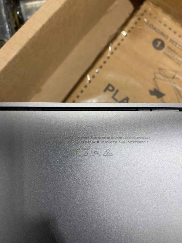 Photo 1 of Apple MacBook Air 2020 13.3-inch (Apple M1 Chip, 8GB RAM, 128GB SSD Storage) - Space Gray (Renewed)