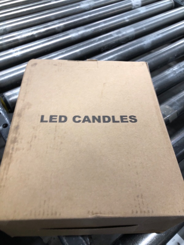 Photo 1 of GenSwin Solar Candles Outdoor Waterproof, 10”x4” Large Solar Rechargeable Flameless Candles, Pillar Powered Candles with Sensor, Dusk to Dawn, for Lanterns, Pation, Home Decor(Set of 2)
