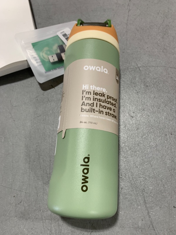 Photo 1 of Owala FreeSip Insulated Stainless Steel Water Bottle with Straw, BPA-Free Sports Water Bottle, Great for Travel, 24 Oz, Camo Cool