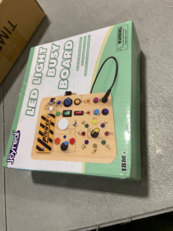 Photo 1 of Joyreal Montessori Busy Board Wooden Sensory Toys for Toddler with LED Light Up Switch, Baby Fidget Board Travel Toys for 18+ Months, 1 2 3 Year Old Boys Girls Toddler Toy Gifts (Classic)