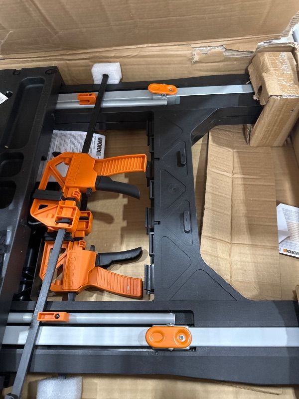 Photo 1 of ** PARTS ONLY ** 
Worx Pegasus 2-in-1 Folding Work Table & Sawhorse, Easy Setup Portable Workbench, 31" W x 25" D x 32" H Lightweight Worktable with Heavy-Duty Load Capacity, WX051 - Includes 2 Clamps & 4 Clamp Dogs