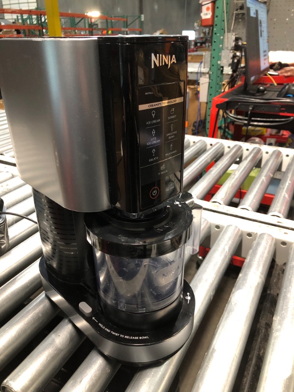 Photo 1 of **PARTS ONLY, MISSING EXTRA CONTAINER, DOESN'T TURN ON** Ninja NC301 CREAMi Ice Cream Maker, for Gelato, Mix-ins, Milkshakes, Sorbet, Smoothie Bowls & More, 7 One-Touch Programs, with (2) Pint Containers & Lids, Compact Size, Perfect for Kids, Silver