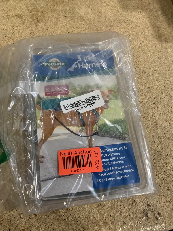 Photo 1 of PetSafe 3 in 1 Dog Harness - No Pull Solution for Dogs - Reflective Dog Harness - Front D-Ring Clip Helps Stop Pulling - Comfortable Padded Straps - Top Handle Enhances Control - Teal - Extra Small