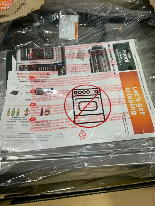 Photo 1 of ***(MAJOR DAMAGE/ SEE NOTES)***
Ninja SP101 Digital Air Fry Countertop Oven with 8-in-1 Functionality, Flip Up & Away Capability for Storage Space, with Air Fry Basket, Wire Rack & Crumb Tray, Silver