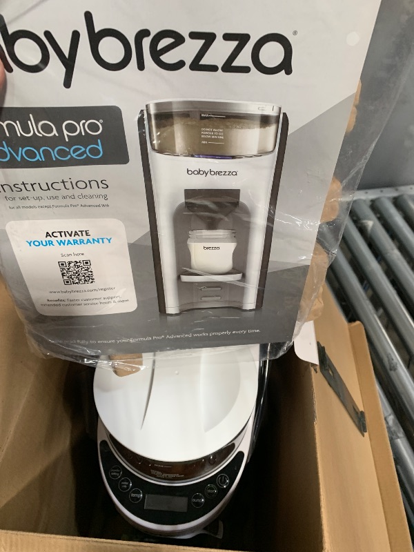 Photo 1 of Baby Brezza New and Improved Formula Pro Advanced Formula Dispenser Machine - Automatically Mix a Warm Formula Bottle Instantly - Easily Make Bottle with Automatic Powder Blending, White