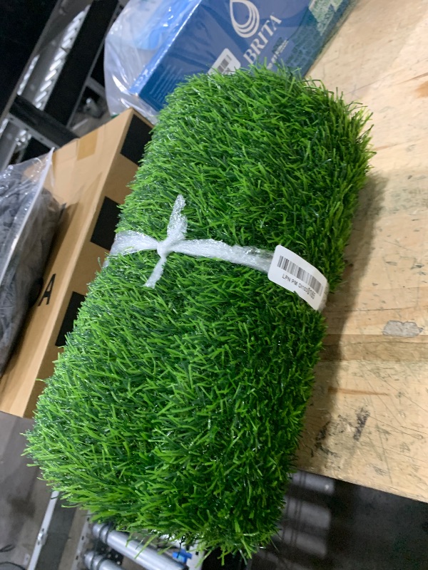 Photo 1 of Kesfey  Table Runners 12 x 120 Inch Artificial Grass Table Runners Washable Synthetic Grass Table Runners Grass Rug Trimmable Durable Green Table Runners for Spring Summer Picnic Party Decor