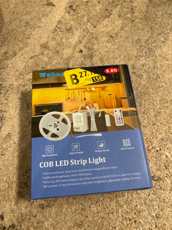 Photo 1 of WOBANE COB LED Strip Light Kit,9.8ft Dimmable LED Light Strip with RF Remote for Kitchen Cabinet,Counter,Shelf,TV Back,3000K Warm White,CRI90+,Surper Bright,1500lm,Timing,960 LEDs,ETL Adapter
