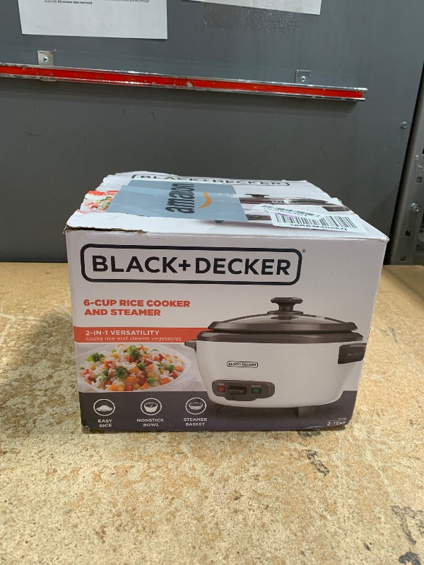 Photo 1 of BLACK+DECKER 6-Cup Rice Cooker, RC506, 3-cup Uncooked Rice, Steaming Basket, Removable Non-Stick Bowl, One Touch