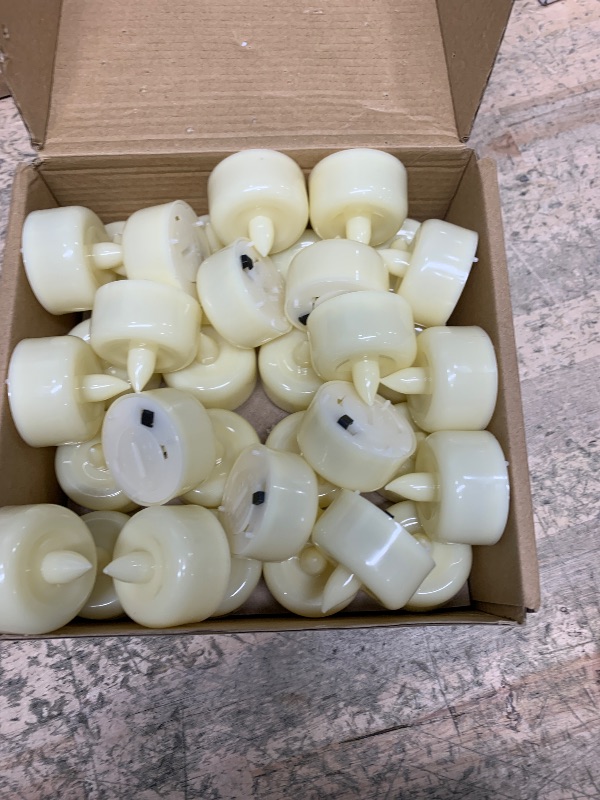 Photo 1 of Amagic 50Pack Flameless LED Tea Lights Candles Battery Operated, Electric Fake Tealight Candles for Votive, Halloween, Christmas, Home Decor, Wedding, Table Decor (50Pack)