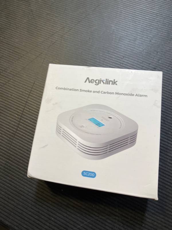 Photo 1 of Aegislink  and Carbon Monoxide Detector 10-Year Lifespan with Replaceable Battery, Photoelectric Fire Alarm and Electrochemical CO Alarm with Test/Silence Button, SC200, 1-Pack