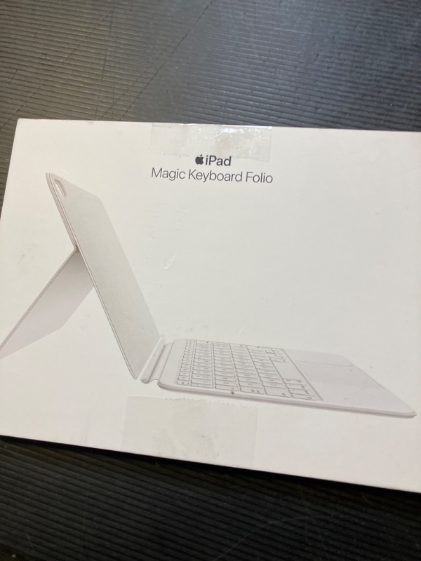 Photo 1 of Apple Magic Keyboard Folio: iPad Keyboard and case for iPad (A16 and 10th Generation), Detachable Two-Piece Design That attaches magnetically, Built-in trackpad, US English – White