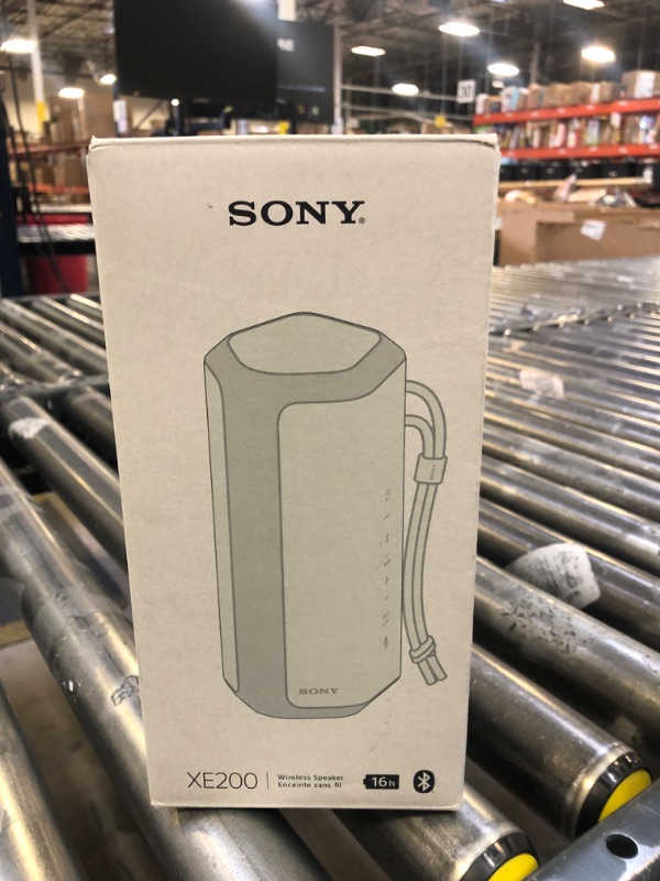 Photo 1 of Sony SRS-XE200 X-Series Wireless Ultra Portable-Bluetooth-Speaker, IP67 Waterproof, Dustproof and Shockproof with 16 Hour Battery and Easy to Carry Strap, Light Gray