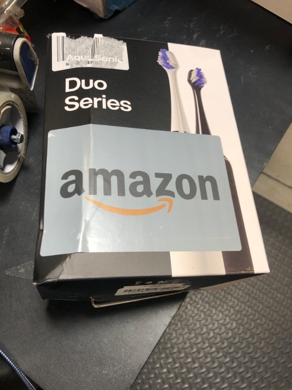 Photo 1 of Aquasonic Duo - Dual Handle Ultra Whitening 40,000 VPM Wireless Charging Electric ToothBrushes - 3 Modes with Smart Timers - 10 Dupont Brush Heads & 2 Travel Cases Included