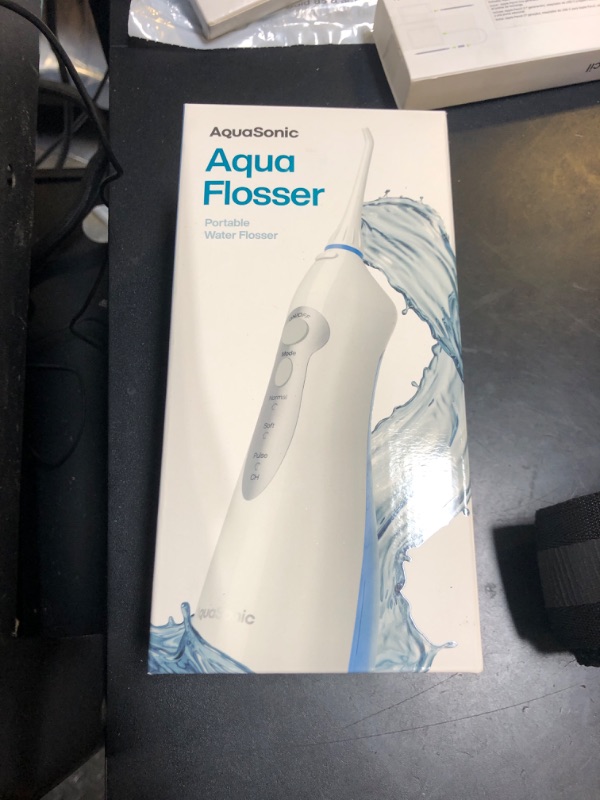 Photo 1 of AquaSonic Water Flosser - Cordless Rechargeable Water Flossers for Teeth Cleaning - Waterproof Aqua Flosser, Portable Oral Irrigator for Dental Cleaning with 5 Jet Tips – Braces Home Travel
