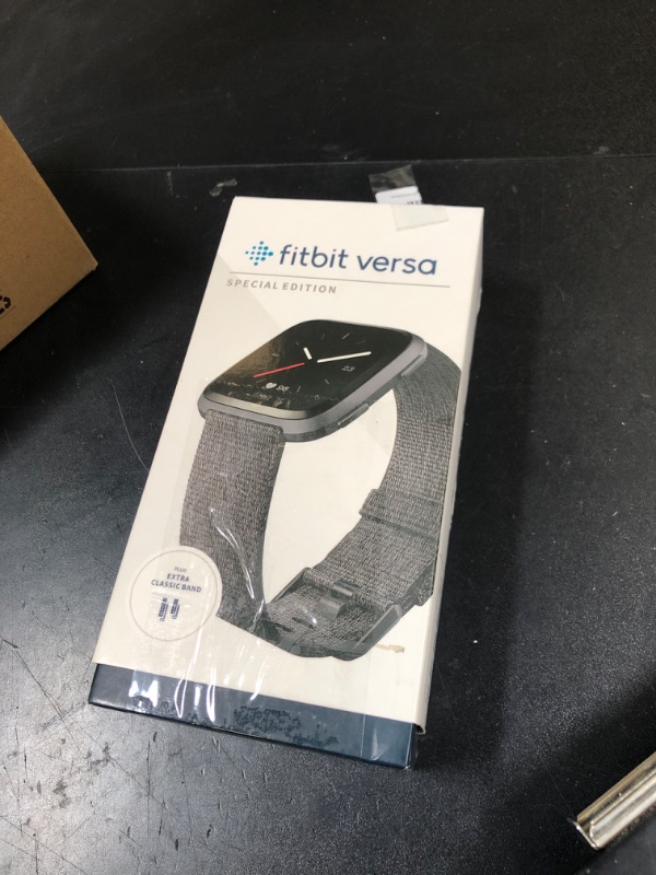 Photo 1 of Fitbit Versa Special Edition Smart Watch, Charcoal Woven, One Size (S & L Bands Included)