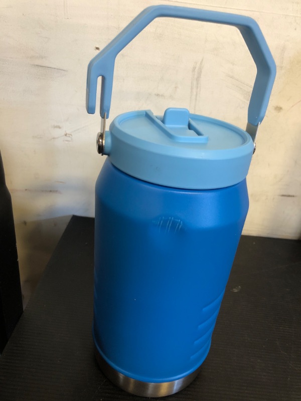 Photo 1 of Stanley IceFlow Flip Straw Jug with Handle 64 oz| Twist On Lid and Flip Up Straw | Leak Resistant for Travel and Sports | Insulated Stainless Steel | BPA-Free | Azure