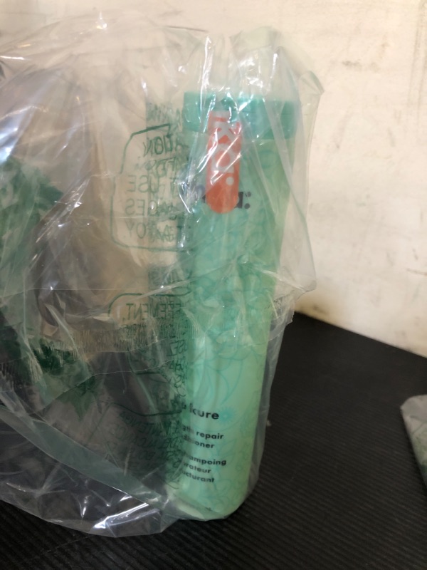 Photo 1 of amika the kure strength repair conditioner, 275ml