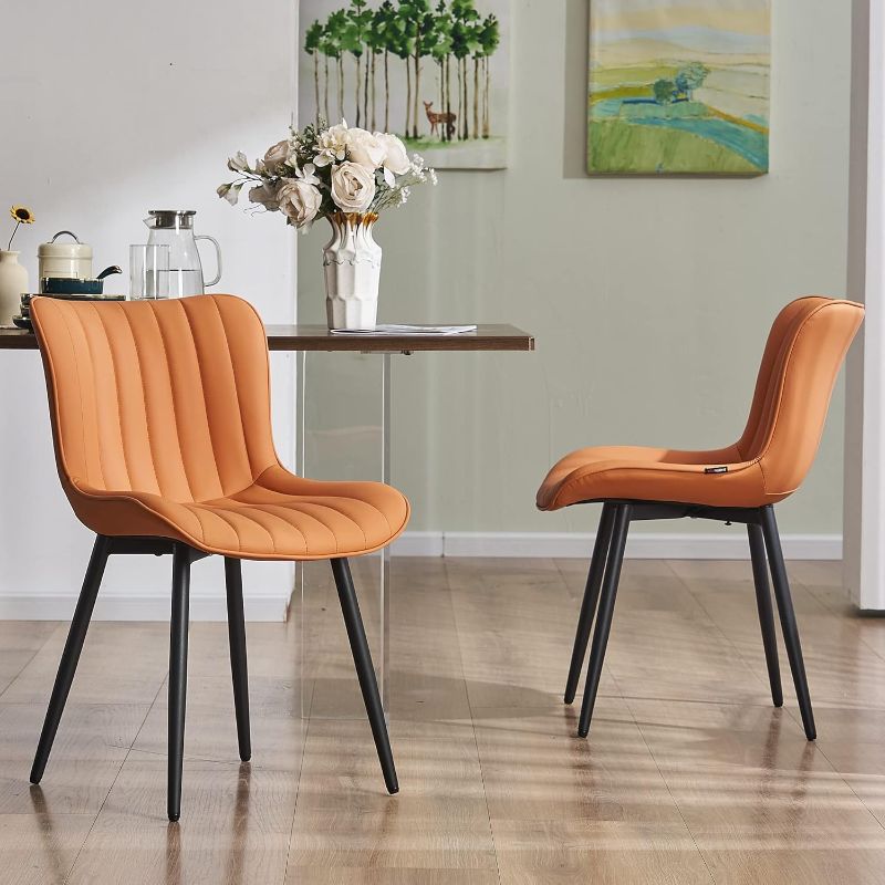 Photo 1 of YOUNUOKE Dining Chairs Set of 2 Camel Mid Century Modern Kitchen Chairs Armless Faux Leather Upholstered Dinner Side Chair with Back for Guest Reception Living Room, Matte Orange