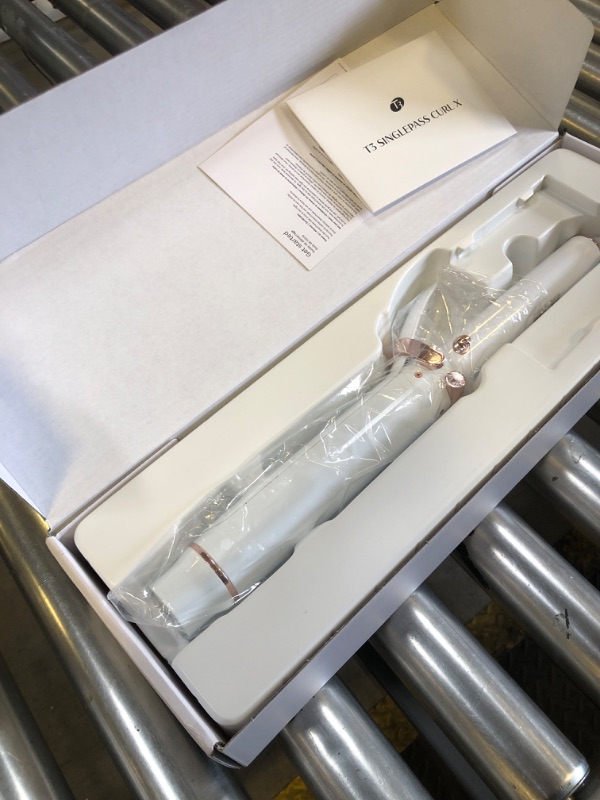 Photo 1 of T3 SinglePass Curl X Extra-Long Barrel Curling Iron with 9 Heat Settings and Ceramic Barrel for Fast Styling and Lasting Results on All Hair Types