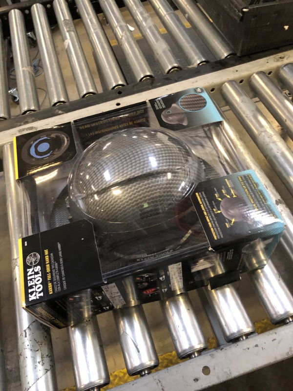 Photo 1 of Klein Tools 60345 Hard Hat, Non-Vented Full Brim, Premium KARBN Pattern, Class E, Tested up to 20kV, Padded Sweat-Wicking Sweatband, Top Pad