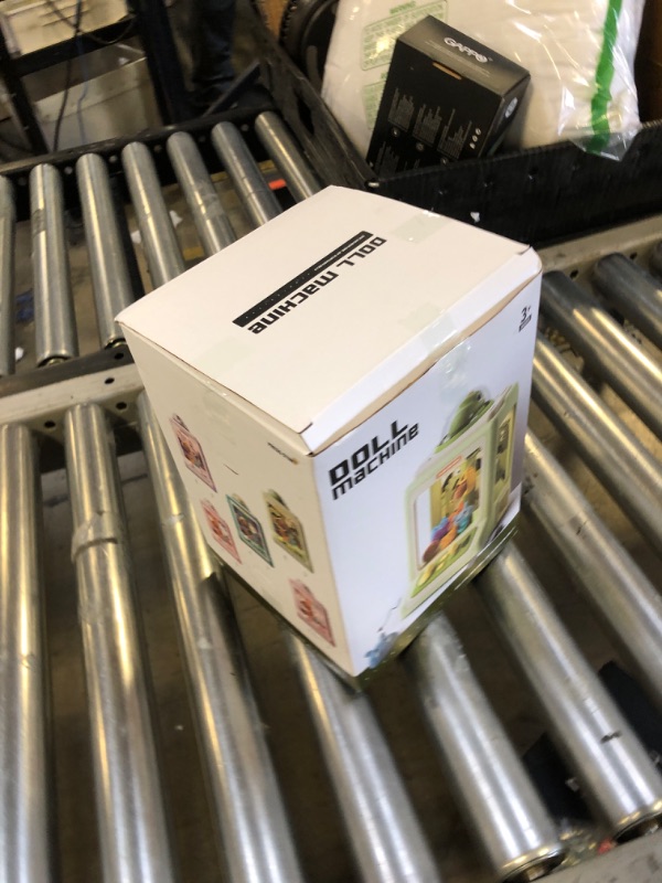 Photo 1 of Claw Machine for Kids, Mini Vending Machine with Game Coins & Music, Prize Dispenser Toys for Girls and Boys, Electronic Claw Game Machine for Party Birthdays, Includes 35 Mini Toys (Doggy Pink)