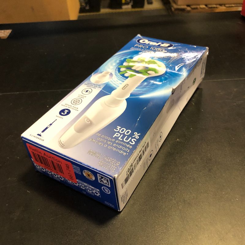 Photo 1 of Oral-B Pro 1000 Rechargeable Electric Toothbrush, White
