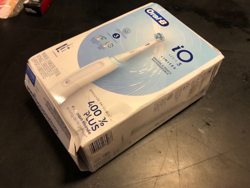 Photo 1 of Oral-B iO Deep Clean Rechargeable Electric Powered Toothbrush, White with iO Series 3 Limited, 2 Brush Heads and Travel Case - Pressure Sensor to Protect Gums - 3 Cleaning Settings - 2 Minute Timer