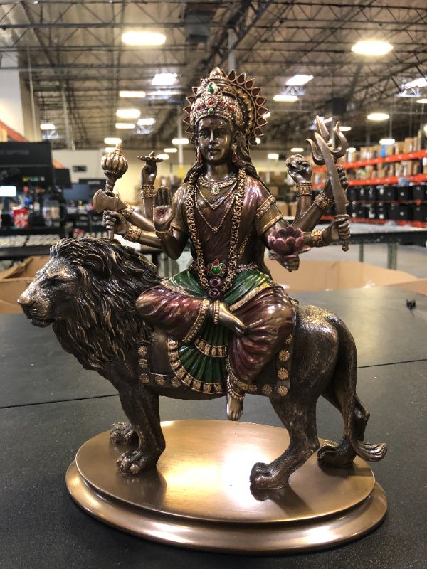 Photo 1 of Veronese Design 10 3/8 Inch Divine Mother Durga Riding Lion Hindu Goddess Resin Statue Bronze Finish