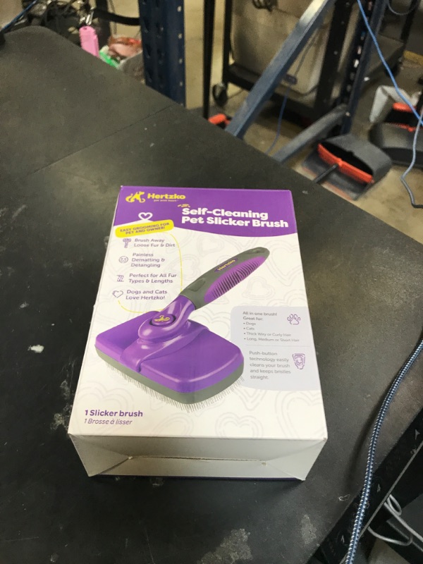 Photo 1 of Hertzko Self Cleaning Slicker Brush for Dogs and Cats - Pet Hair Brush for Shedding Long and Short Hair - Easy Clean Retractable Bristles - Cat and Dog Grooming Tool - Purple