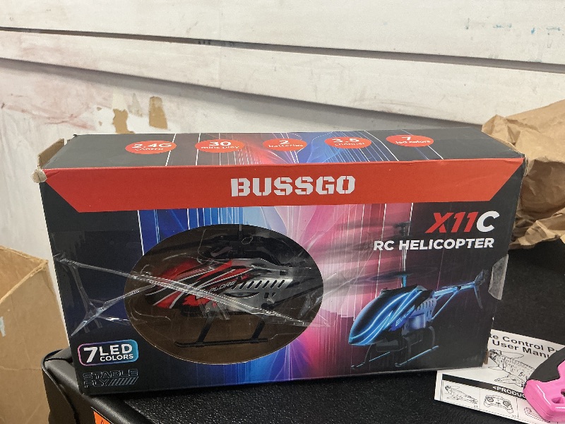 Photo 1 of BUSSGO RC Helicopter, Remote Control Helicopter for Kids with 30Mins Flight(2 Batteries), 7+1 LED Light Modes, Altitude Hold, RC Toys for Boys Girls