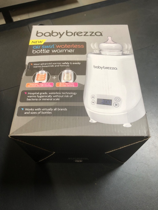 Photo 1 of Baby Brezza AirSwirl Waterless Baby Bottle Warmer - Safely Warm Breastmilk + Formula - Bottles Stay Dry + Nutrients are Protected - Works with Nearly All Bottles