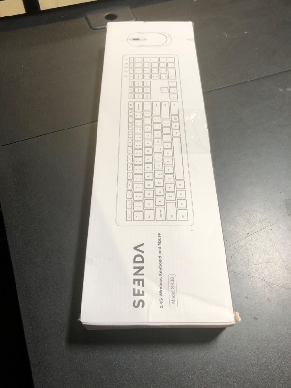 Photo 1 of Wireless Keyboard and Mouse Combo - Full Size Slim Thin Wireless Keyboard Mouse with Numeric Keypad 2.4G Stable Connection Adjustable DPI (White & Silver)