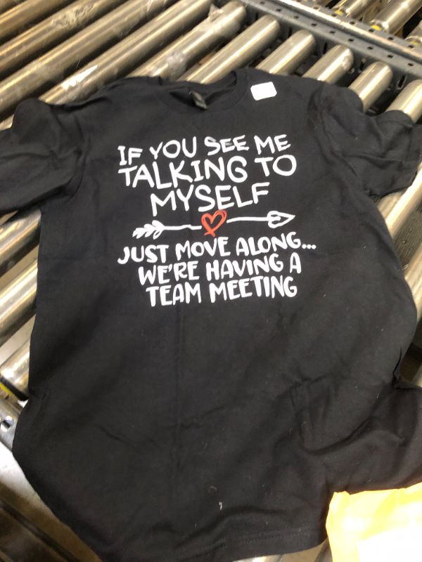 Photo 1 of small shirt 
