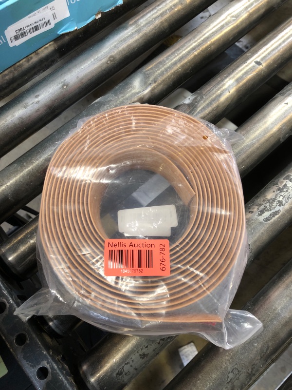 Photo 1 of Floor Transition Strip 2" Self Adhesive Flat Vinyl Flooring Transitions Strip with Strong Backing (5cm, 20FT, Brown Wood Grain)