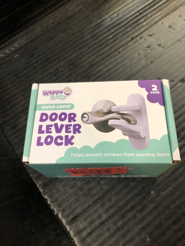 Photo 1 of Door Lever Lock (2 Pack) – Prevents Toddlers from Opening Doors – Easy One-Hand Operation for Adults – Durable ABS with 3M Adhesive Backing – No Tools Needed for Install