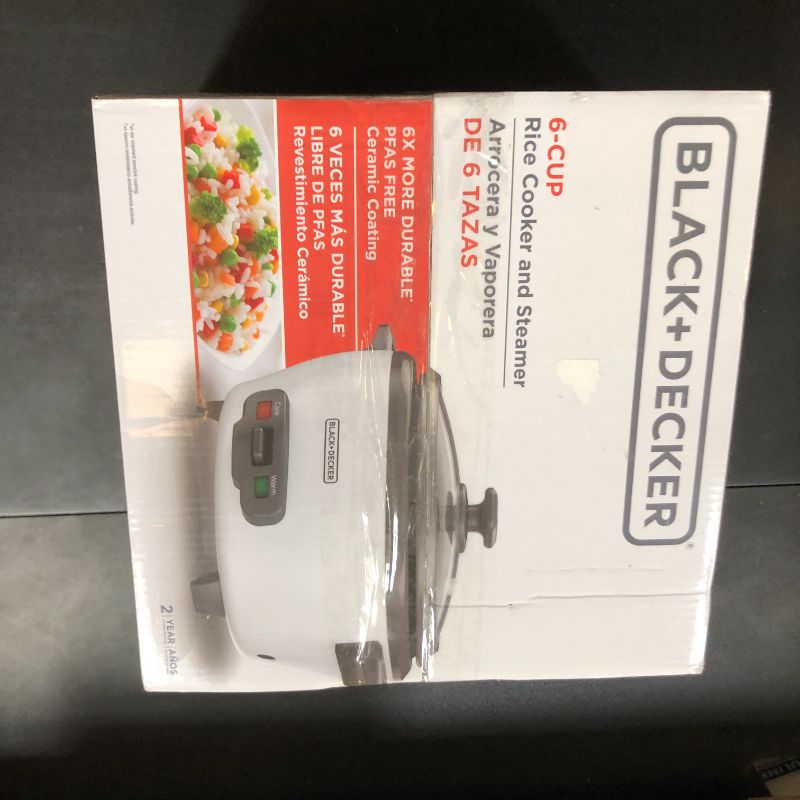 Photo 1 of BLACK+DECKER 6-Cup Rice Cooker, RC506, 3-cup Uncooked Rice, Steaming Basket, Removable Non-Stick Bowl, One Touch
