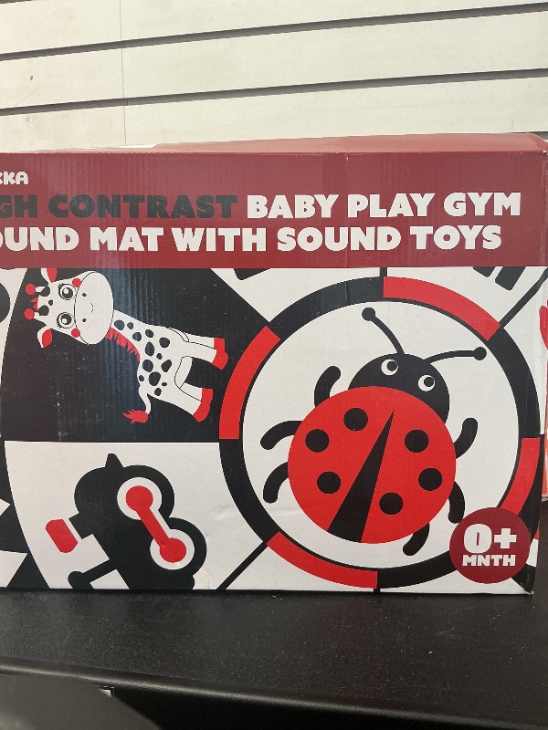 Photo 1 of QUOKKA Padded Baby Gym Mat for Floor Tummy Time - High Contrast Baby Kick and Play Gym Mat - 6 Toys | Thick Pad | Machine Washable | Black White Red Colors for Vision Development