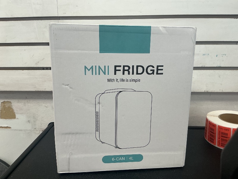 Photo 1 of Simple Deluxe Portable Mini Fridge 4-Liter/6 Can 100% Freon-Free Cooler & Warmer Compact Refrigerator for Skincare, Cosmetics, Beverage, Food, 4L, Red