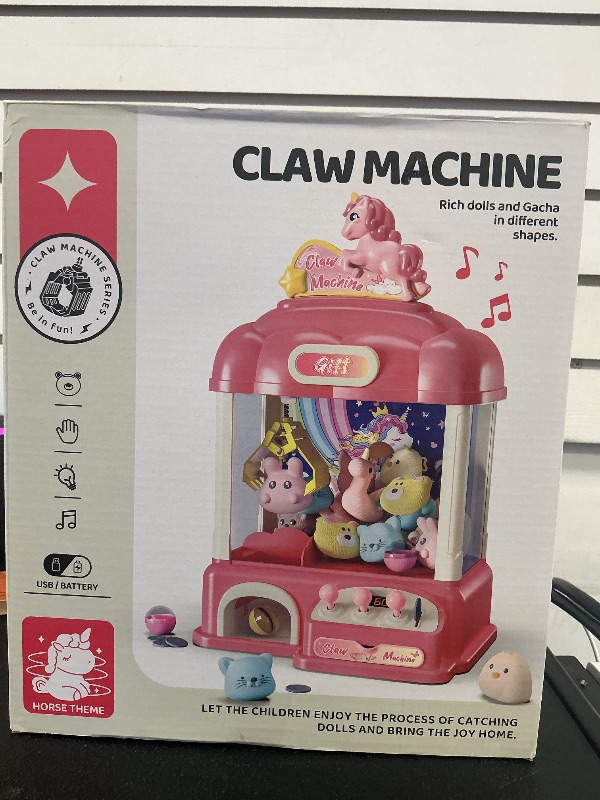 Photo 1 of AIQI 60 PCS Unicorn Kids Claw Machine, Vending Claw Machine with Lights Sound, Candy and Prize Electronic Dispenser Game Toys for Kids, Claw Machine Toys for 3 4 5 6 7 8 Years Old Girls