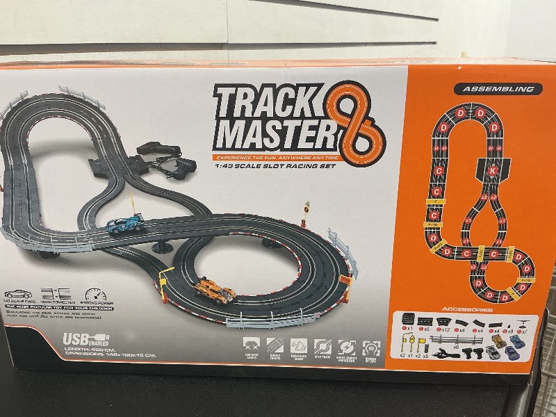 Photo 1 of Electric Slot Car Race Track Sets - Race Car Track Sets with 4 High-Speed Slot Cars 1:43 with Headlights, 2 Hand Controllers, Dual Racing Game Lap Counter, Birthday, Toys for Children